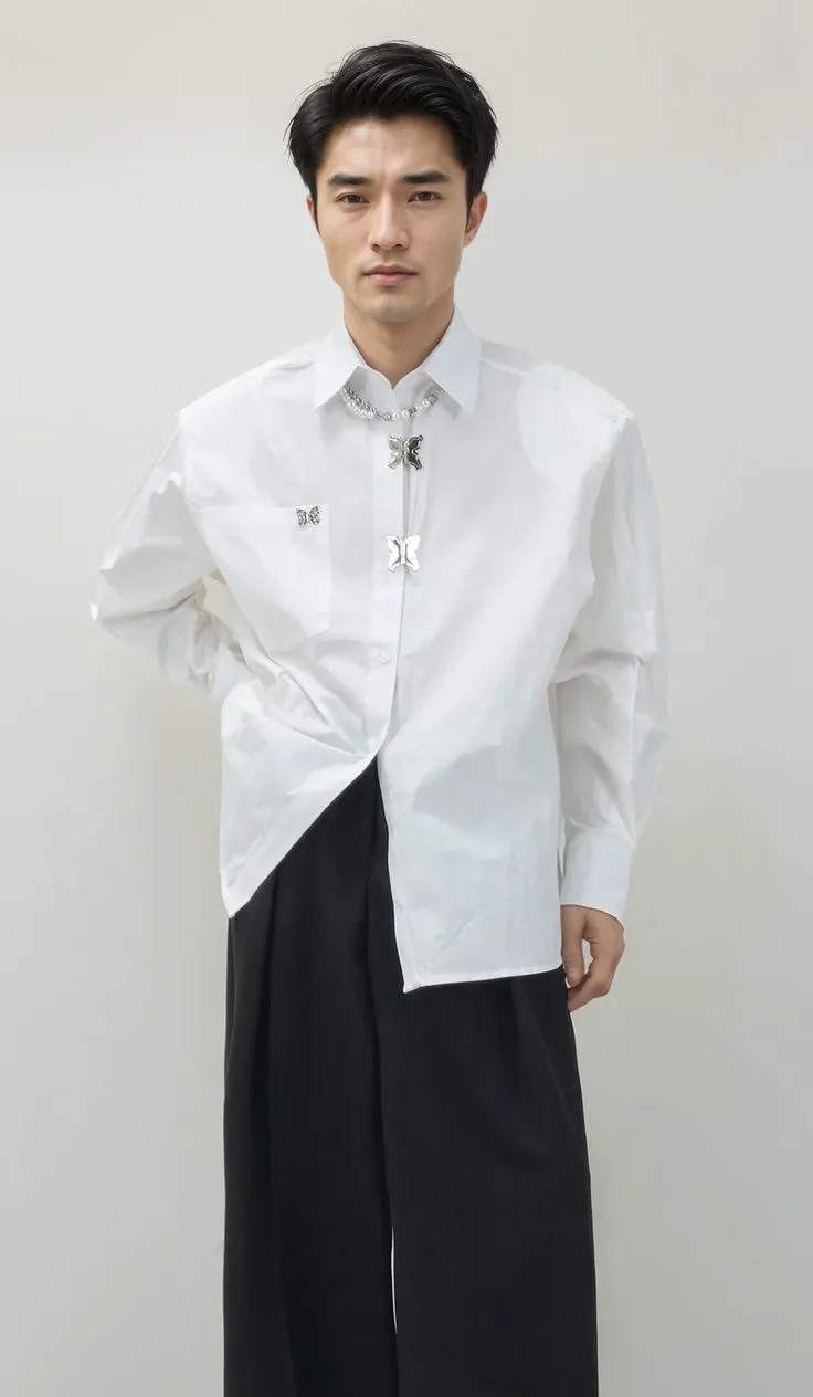 Oversized Shoulder-Padded Shirt with Metallic Brooch Accents